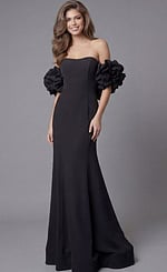 Jovani 45653 black off-the-shoulder mermaid evening gown with sweetheart neckline, dramatic oversized ruffle puff sleeves, and floor-length fitted silhouette.