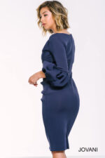 Back view of Jovani 39738 navy dress emphasizing fitted silhouette and puff sleeves.