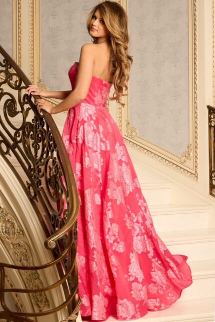 Back View Of Embroidered Strapless Gown With Flowing Skirt