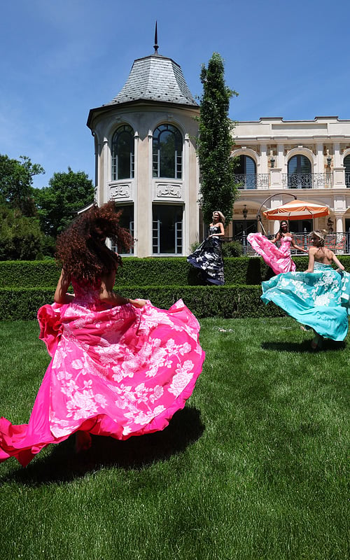 strapless jacquard gown with floral embroidery - group back view, dresses flowing, vibrant, dancing