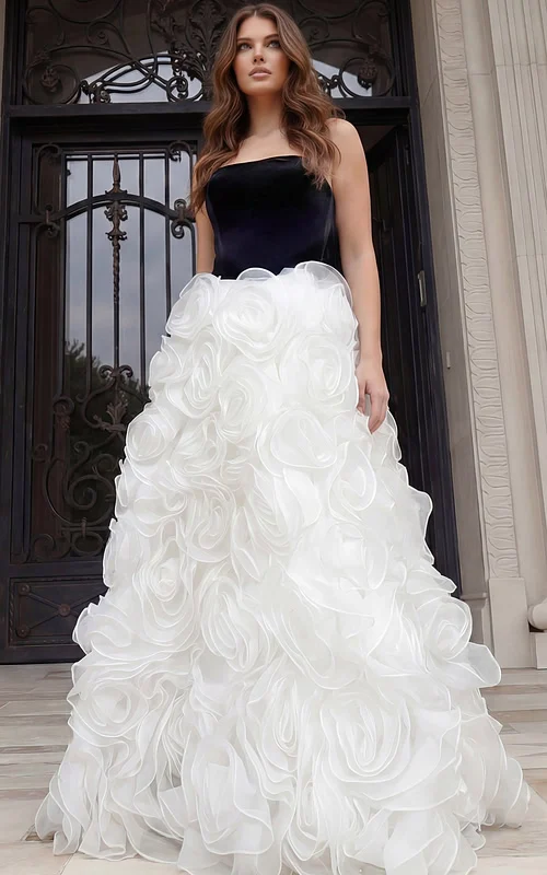 Full length strapless gown with dramatic white rosette skirt and structured bodice