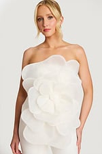 Close-up of floral organza detail on strapless jumpsuit