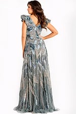 Elegant grey ball gown with layered embellishments and flowing skirt