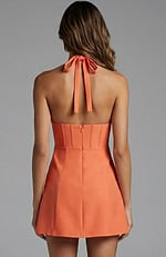 Halter neck corset mini dress with deep V neckline and fitted silhouette