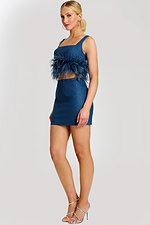 Model Wearing Denim Two-Piece Set with Feather Trim Crop Top and Mini Skirt