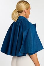 Back Angle View of Flared Denim Cape Jacket with Flowing Silhouette and Shoulder Seams