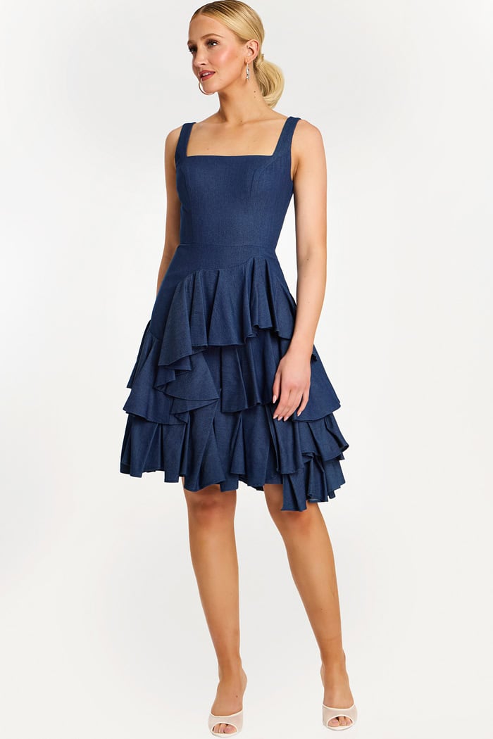 ruffled denim dress Ruffle Denim / SMALL This denim wash romper has a skort skirt and strapless top Ruffled Tiered Denim Cocktail Dress