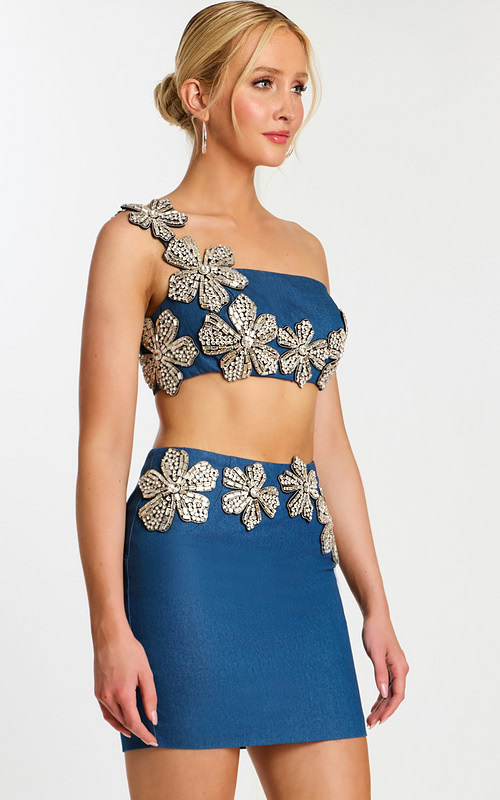 Blue denim crop top and skirt set with beaded flower embellishments