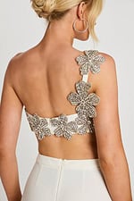 close up of white and silver beaded pantsuit 46007