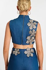 Back zipper view of sleeveless crop top with crystal flowers