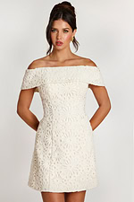 Front view of off-white lace dress with structured bodice and short hemline