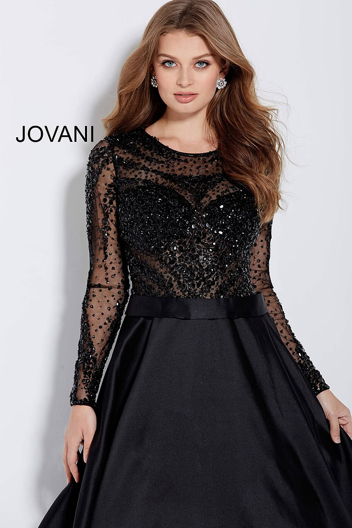 Elegant Jovani 46066 black gown with detailed bodice and long sleeves.