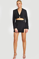 Model Wearing Black Cropped Blazer and Wrap Mini Skirt with Side Cutout