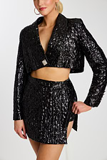 Close-Up of Black Mini Skirt and Crystal Buckle Detail