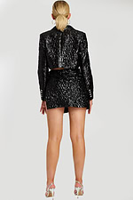 Back View of Glossy Black Blazer and Skirt Set