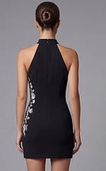 Back view of halter mini dress with clean lines and tailored fit