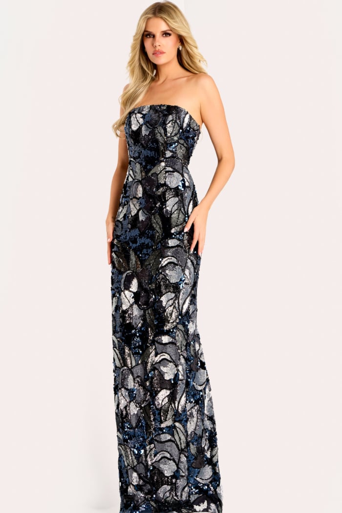 Strapless fitted gown embellished with shimmering floral sequins in navy, silver, and black tones.