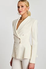 Angled back view showing panel details and sculpted silhouette of off-white blazer