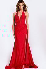 Red halter prom dress with deep neckline and high slit