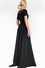 Back view of black jumpsuit showing zipper closure and flared legs