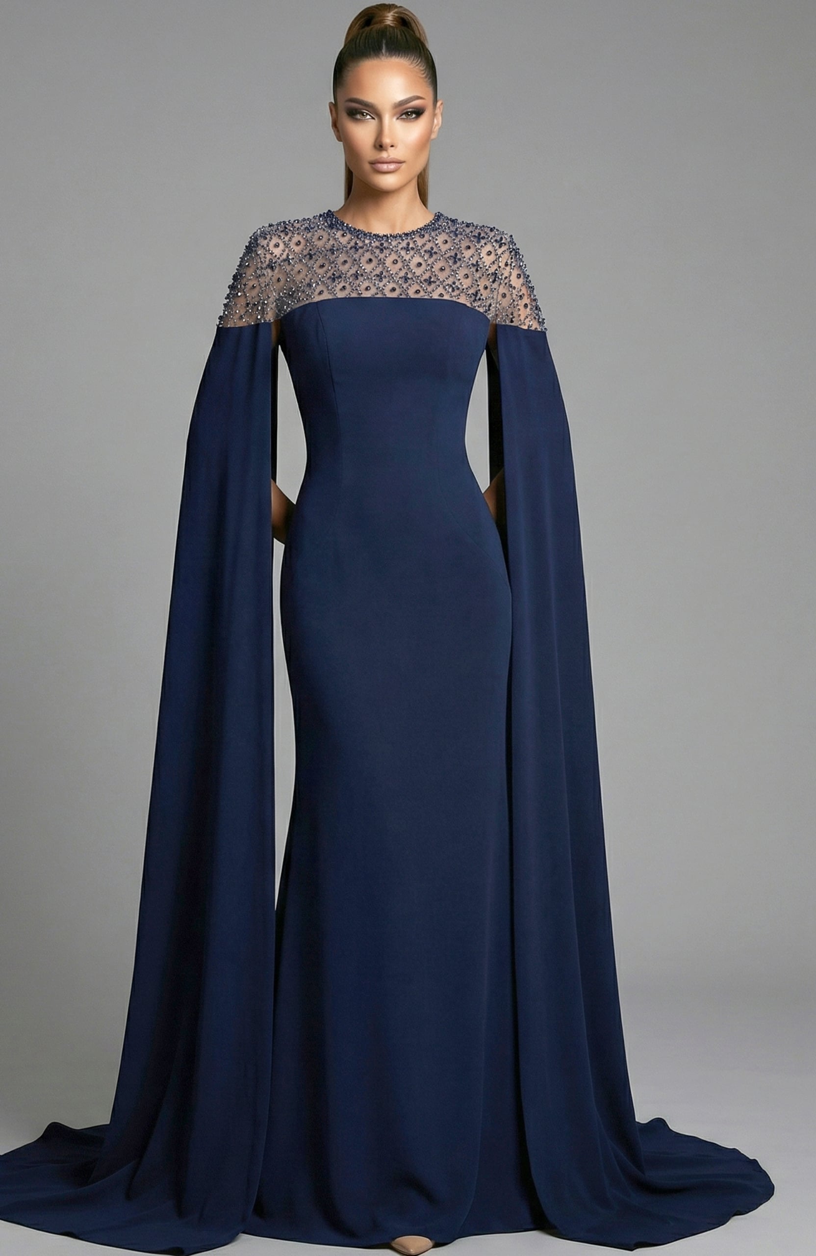 fitted gown with beaded illusion neckline and flowing cape sleeves