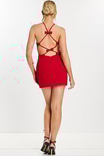 Full back view of red mini dress with black heels and bow detailing