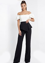 Black tailored wide leg pants with white puff sleeve top