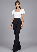 Designer black pants outfit with white puff sleeve top