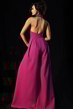 Stylish pink halter jumpsuit with deep neckline and side pockets