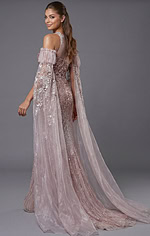 Blush sequin gown with sheer halter neckline and cape sleeves