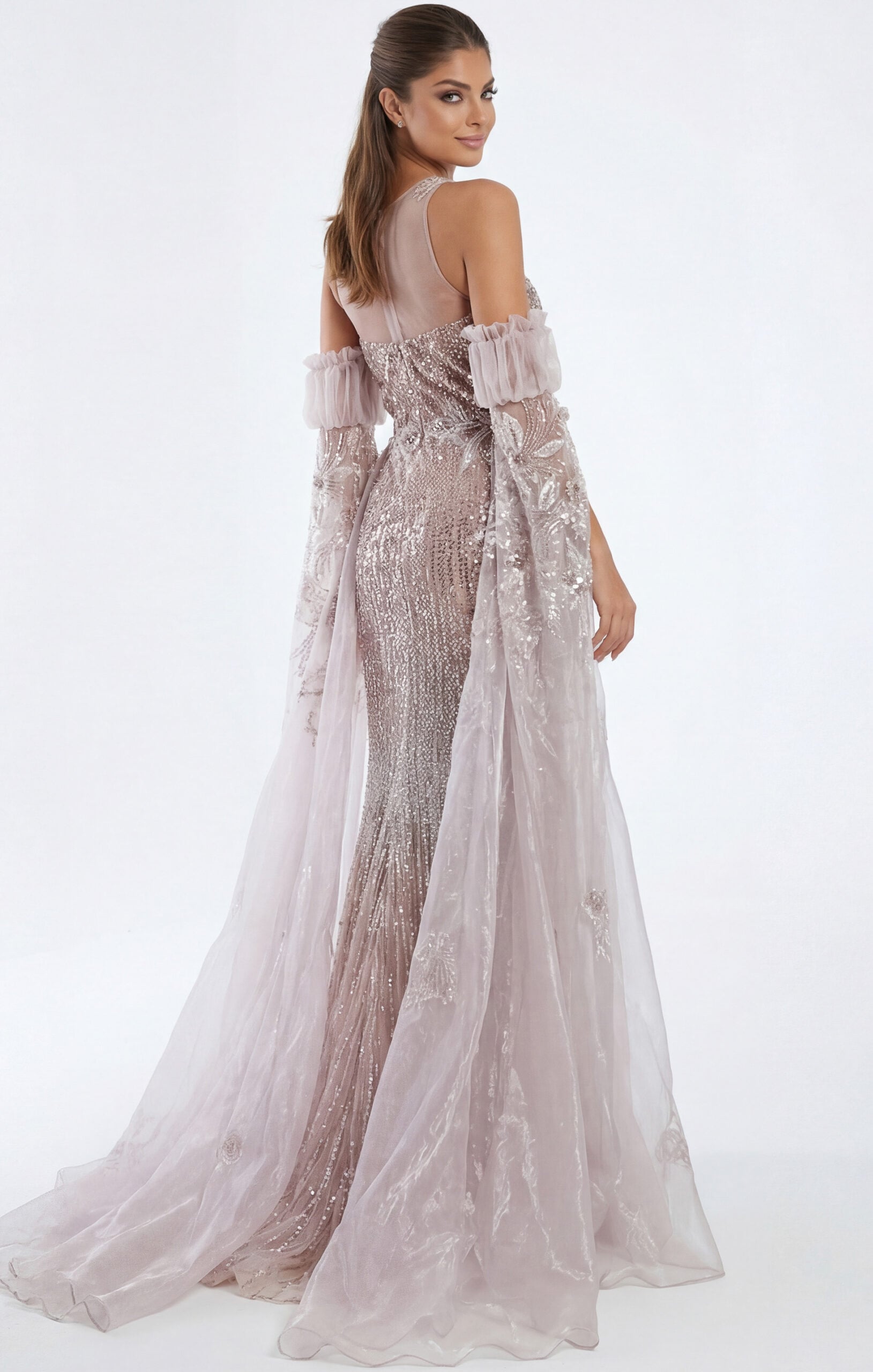 Glamorous blush beaded gown with sheer embroidered cape sleeves