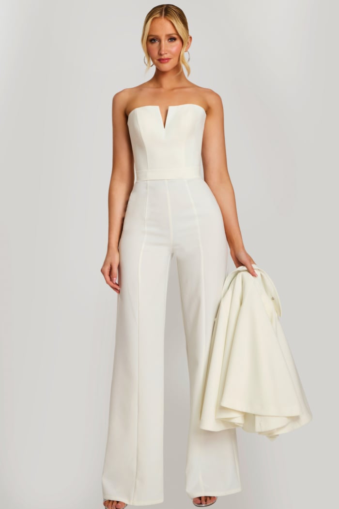Strapless bridal jumpsuit back view with cape draped over shoulder