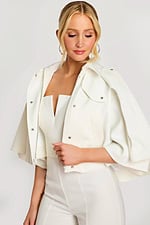 Close-up of bridal white jumpsuit and cape collar with zipper detail