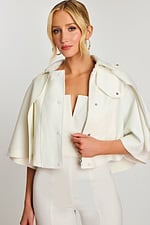 Side close-up showing V-notch neckline and metal zip of bridal cape