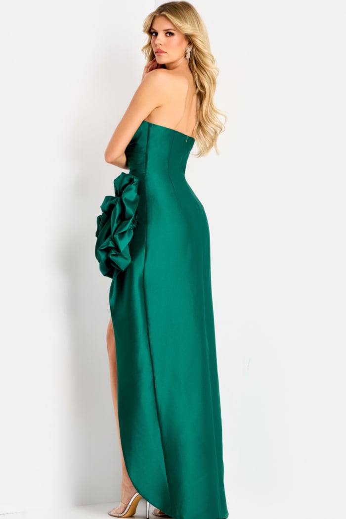 Strapless satin gown with ruched bodice and oversized floral accent