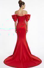 Back view of off shoulder mermaid gown with fitted silhouette and flowing train