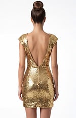 Back view of sequin dress with open V back and smooth fitted silhouette