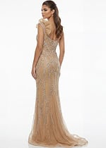 One shoulder beaded mermaid gown with sheer illusion fabric