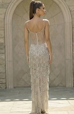 Back view of beaded gown with sheer corset detail and layered fringe skirt