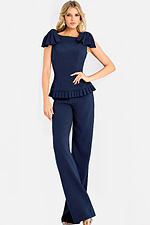 Sophisticated navy outfit with layered shoulders and modern tailored fit