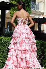 whitered strapless floral ball gown with ruffled skirt - back view, model hands on hips looking left