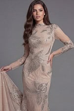 Nude embellished gown with long sleeves and high neckline