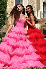 navy tiered tulle sweetheart slit prom dress - two girls front, curly hair looking up, hand on shoulder
