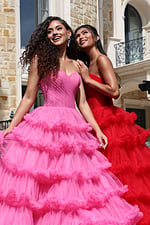 navy tiered tulle sweetheart slit prom dress - two girls front, curly hair, smiling, hand on shoulder