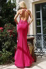 Back view of open criss cross gown with ruched detailing