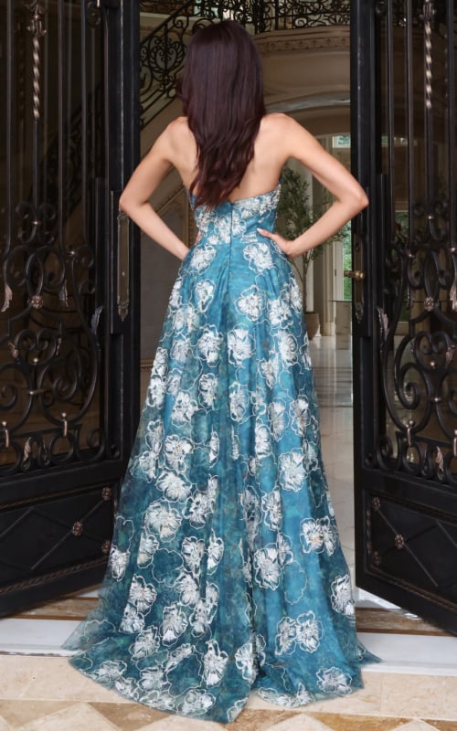 Teal floral appliqué strapless ball gown with full skirt, back view