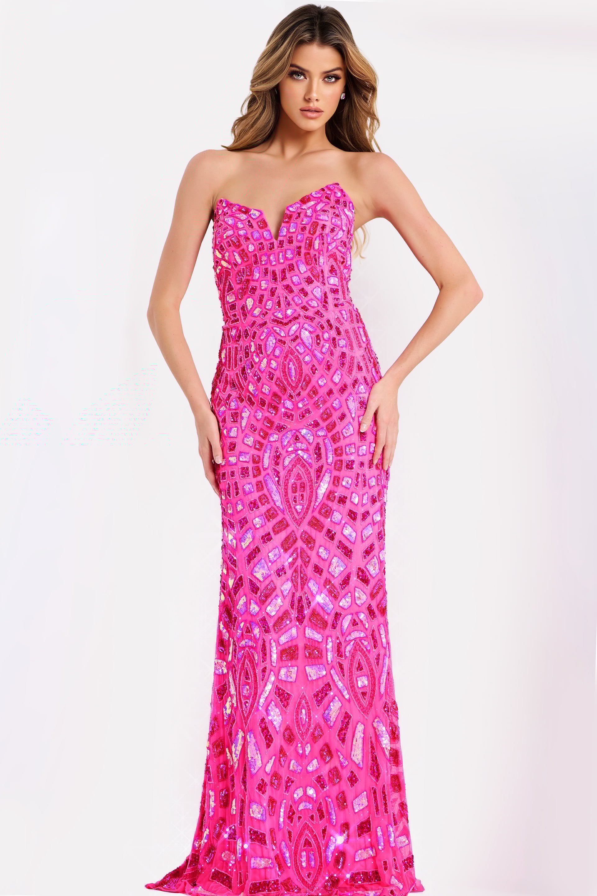 46938 Hot pink fitted prom gown with strapless bodice and reflective beadwork