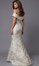 Back view of an off the shoulder evening gown with a fitted silhouette and floor length skirt