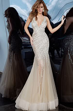 Model in Jovani 4741 nude gown with a deep V-neckline and shimmering sequins.
