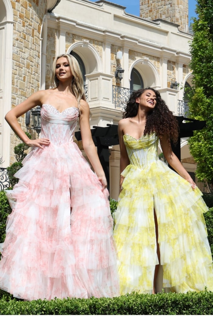 strapless lilac ball gown with beaded bodice - two girls front, blonde hand hip, brunette laughing